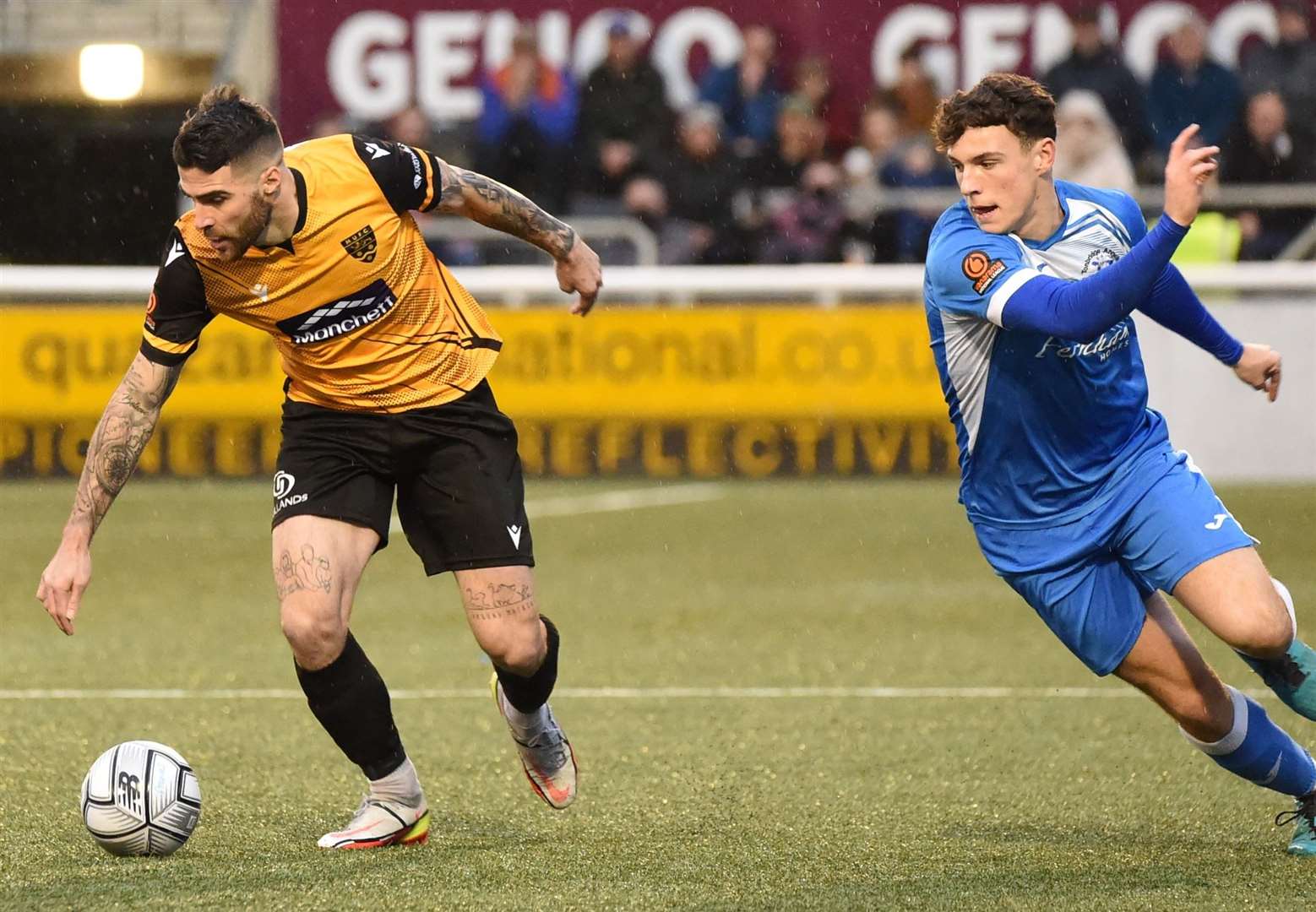 Maidstone winger Joan Luque gets away from Tonbridge defender Luke Jenkins at the Gallagher Picture: Steve Terrell