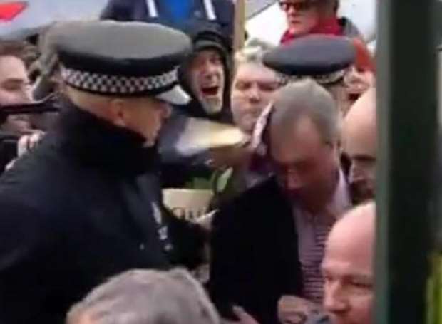 UKIP leader Nigel Farage is hit over the head in Cliftonville. Picture: ITV Meridian