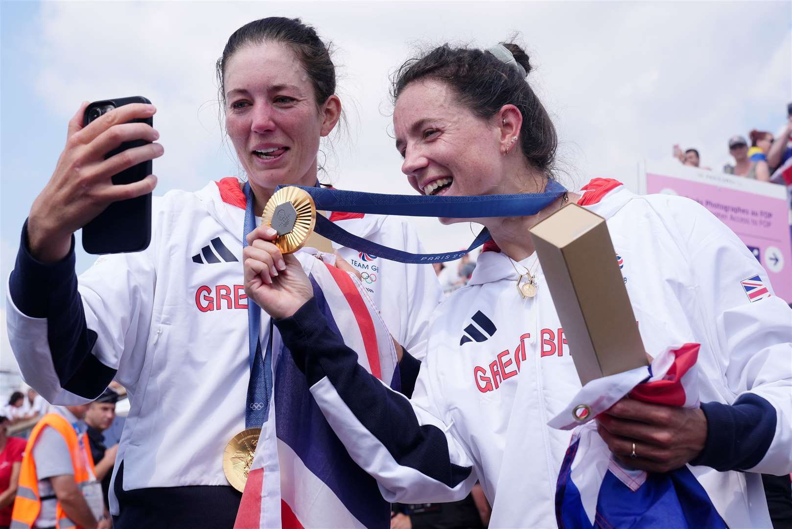 The endless ‘gold rush’: GB rowers Emily Craig and Imogen Grant celebrate with their medals in the lightweight women's double sculls. Photo: John Walton/PA Wire