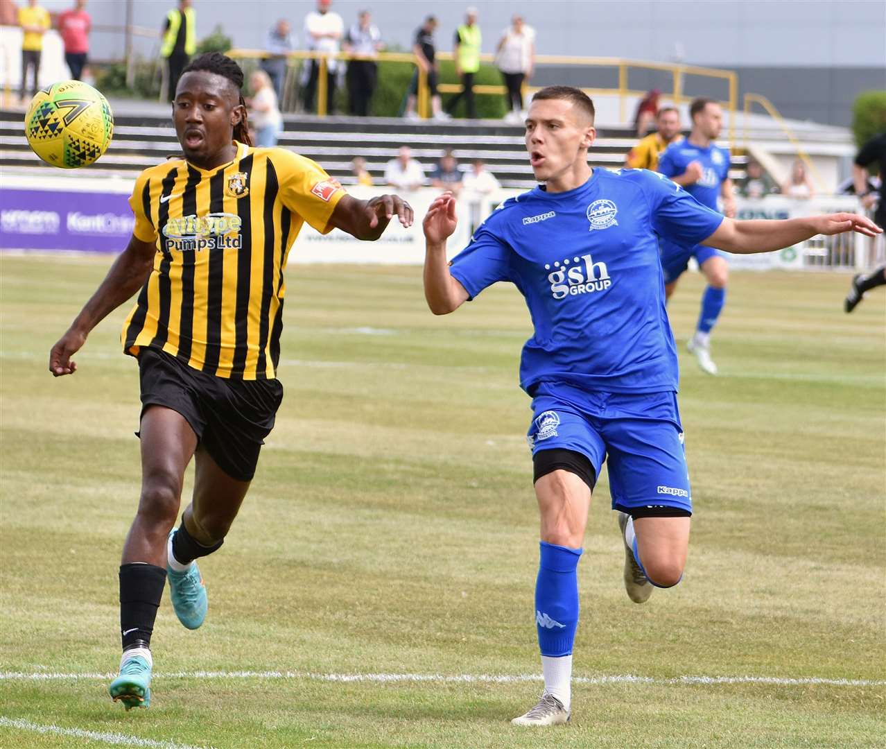 Folkestone forward Kadell Daniel is put under pressure by Dover man Arjanit Krasniqi during Invicta's 1-0 friendly win. Picture: Randolph File