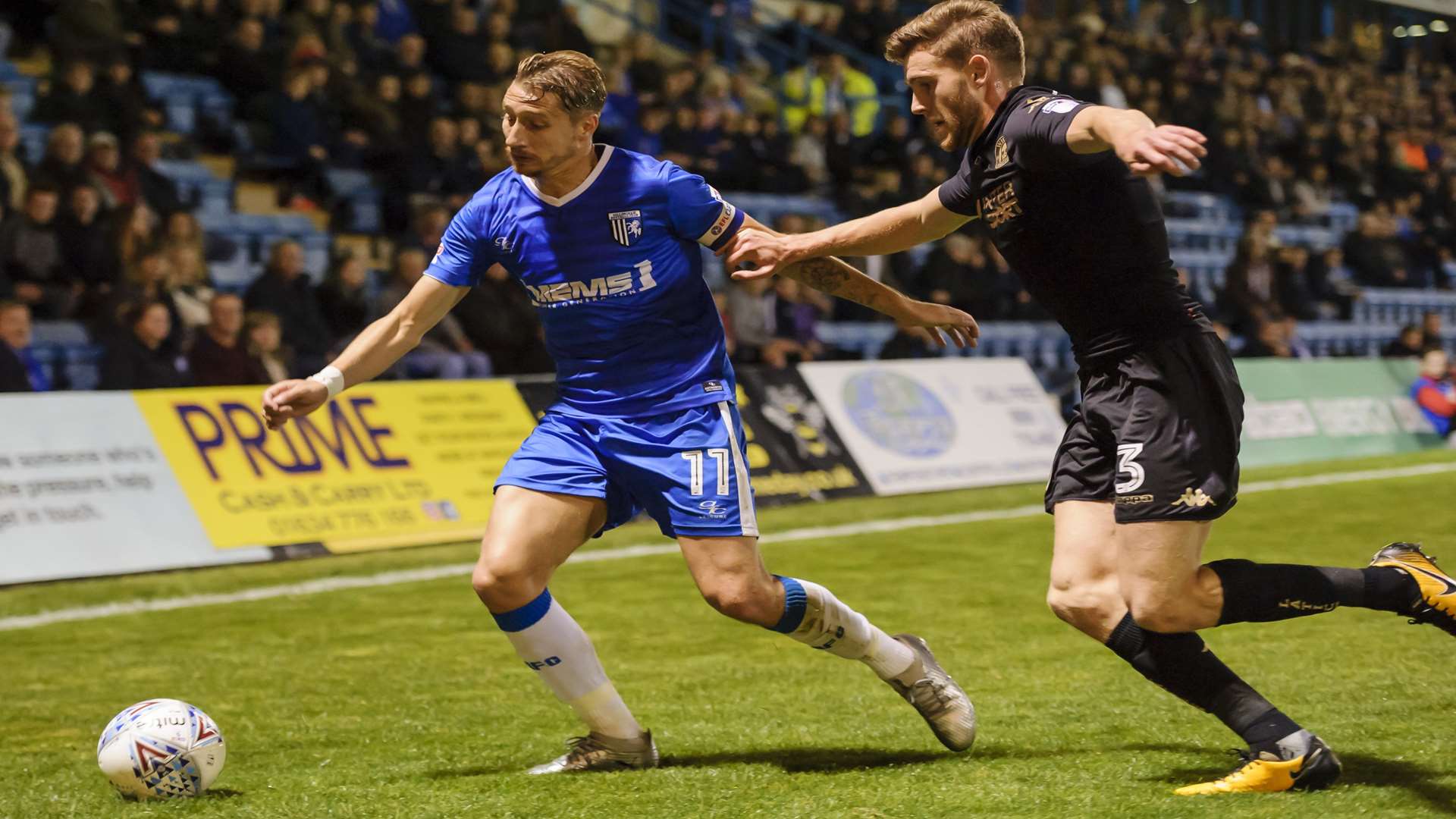 Lee Martin keeps Wigan at arm's length Picture: Andy Payton