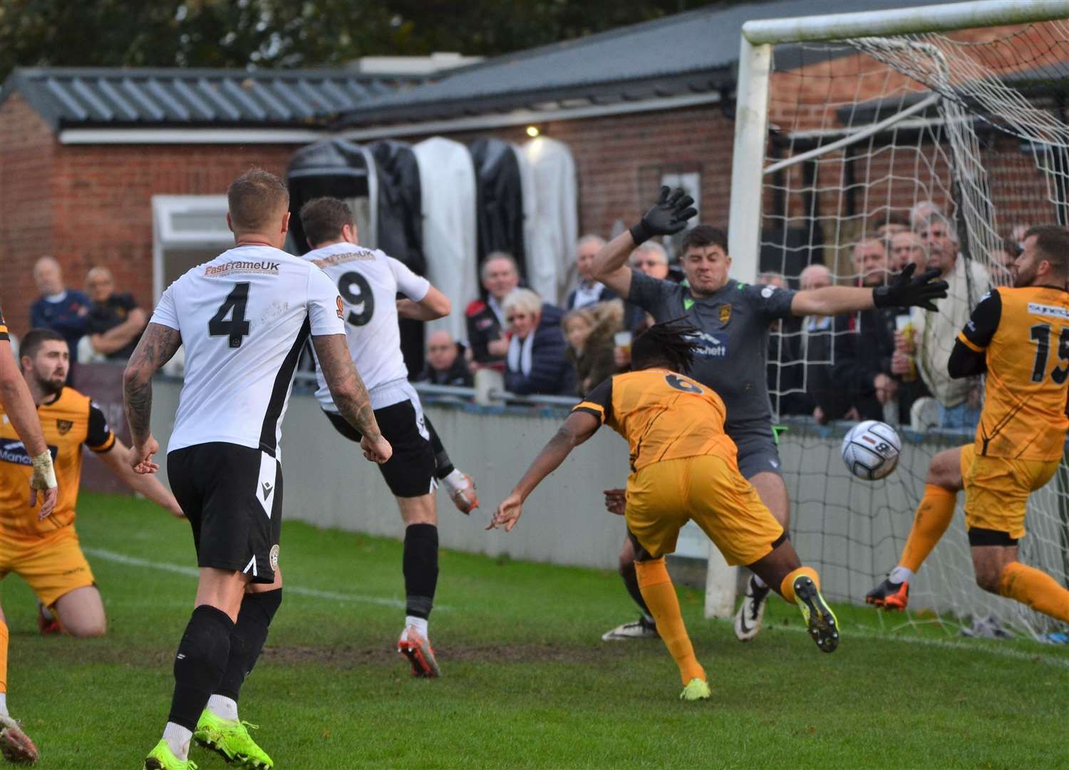 The incident for Regan Booty's first red card sees the Maidstone midfielder block the ball on the line with his knee Picture: Phil Cannings