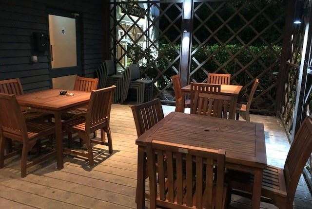 Despite being deserted, in many ways the neat and tidy smoking area was the most inviting part of the pub