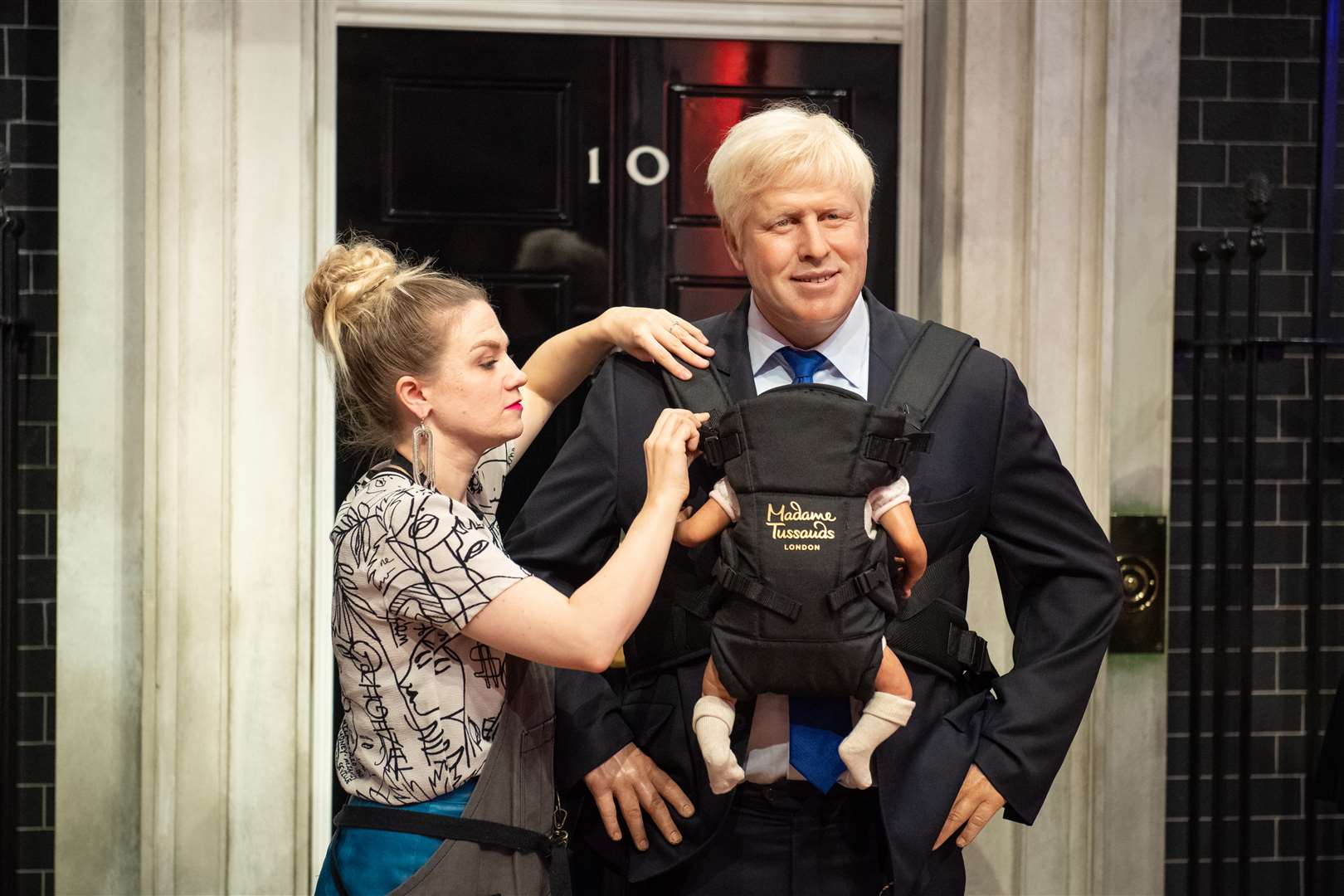 A Madame Tussauds waxwork gives a sneak preview of what Mr Johnson might look like as a doting father (Dominic Lipinski/PA)