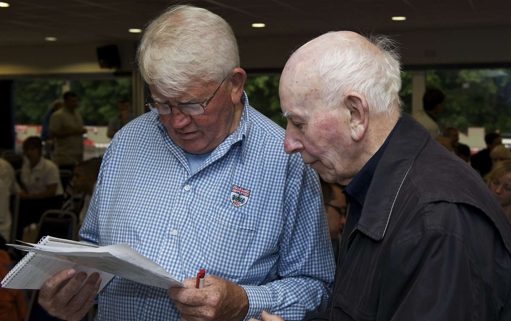 Surtees with veteran Brands Hatch commentator Brian Jones, who died on New Year's Day, at the Henry's Headway Karting Challenge event in 2010. Picture: Andy Payton