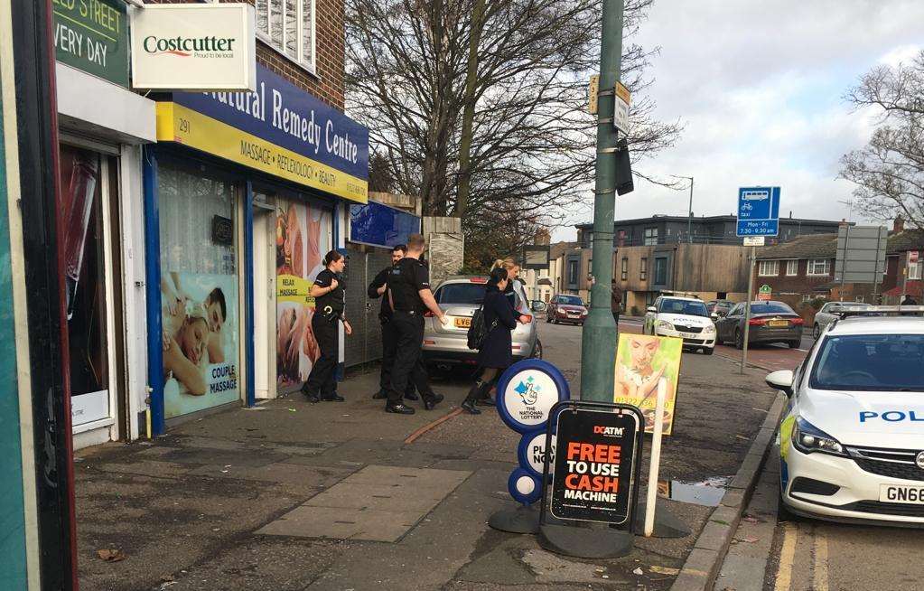 Some people have been led away from the businesses by police