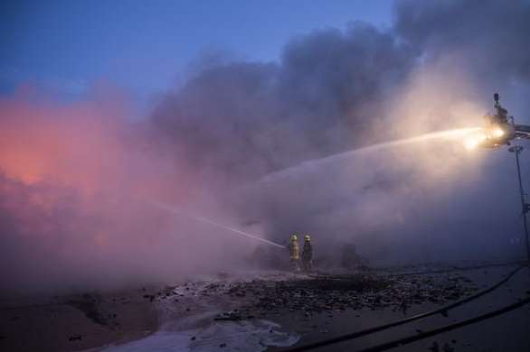 Battling the flames into the night