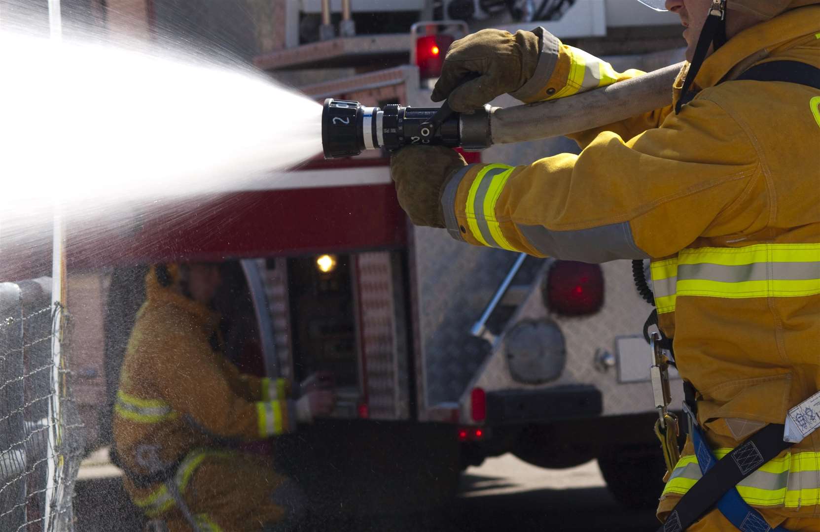 Fire engine are at the scene. Stock image.