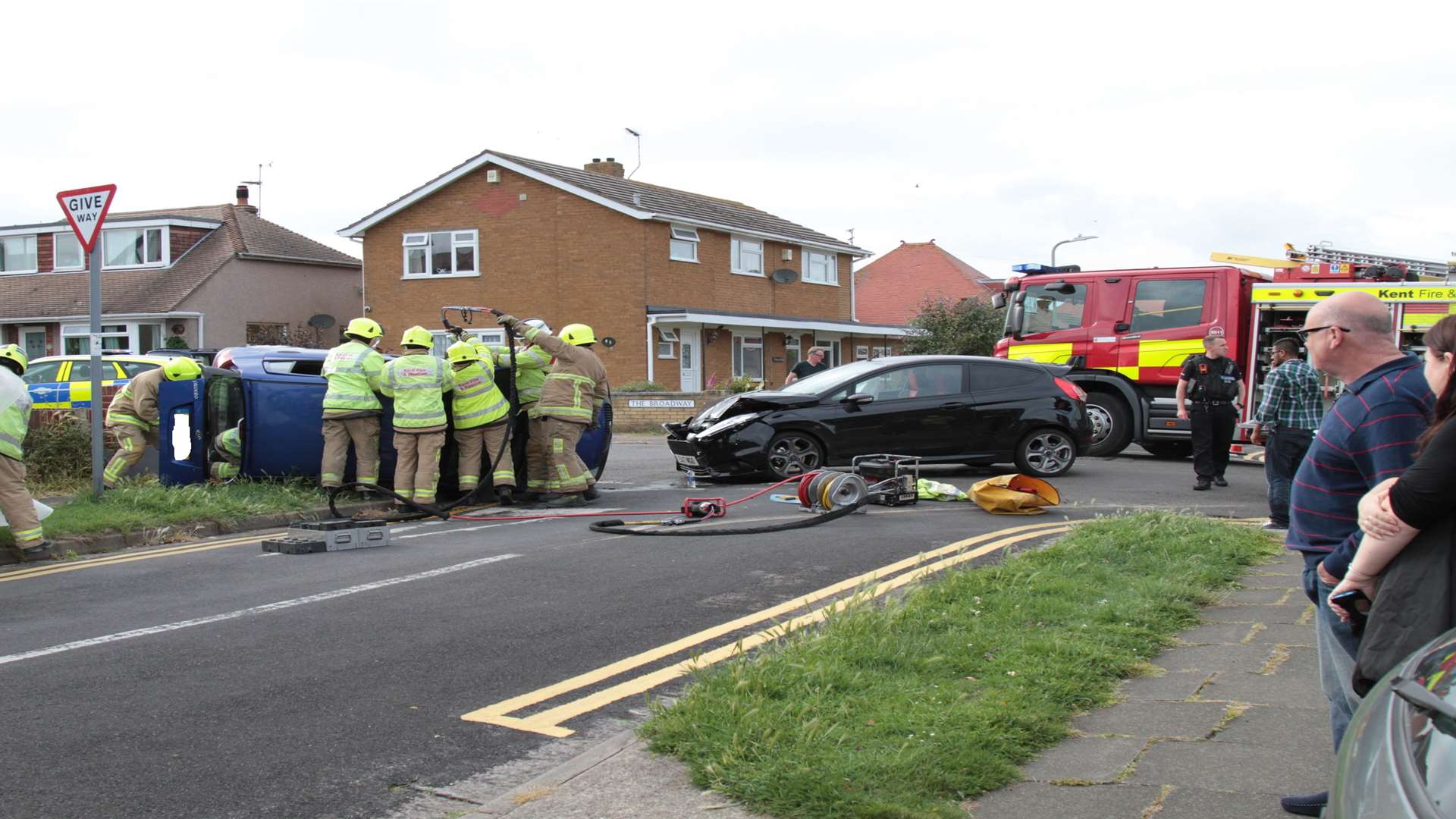 Concerned residents watched the drama unfold