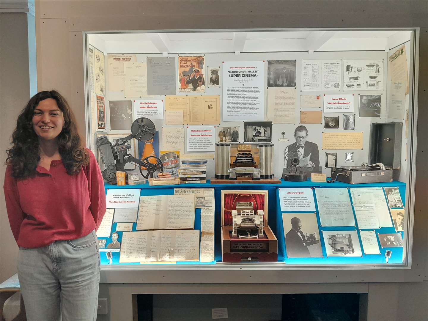 Museum designer Rosanne Mulin with a display about the Alexia Cinema