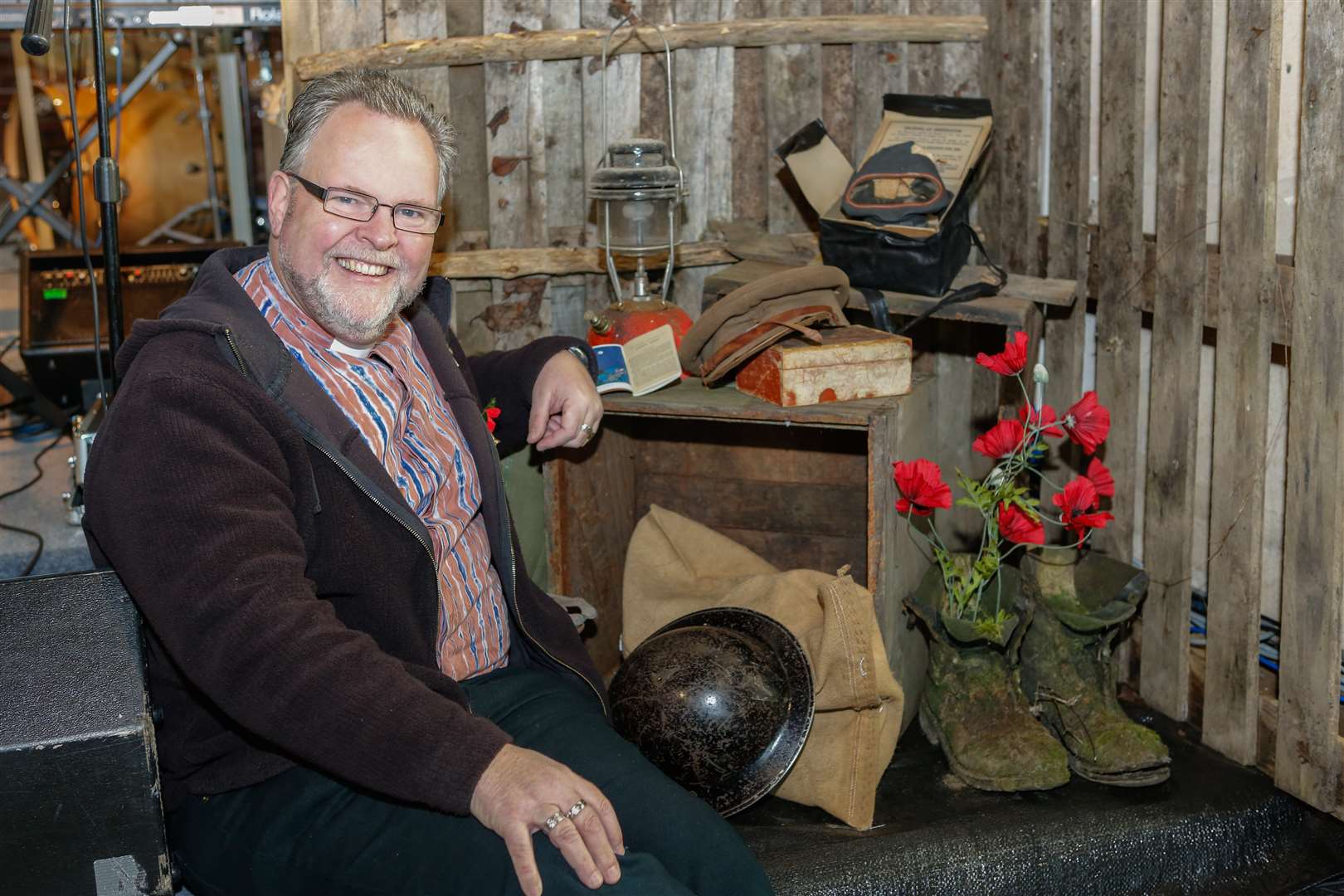 Vicar Chris Key with the First World War-themed displays