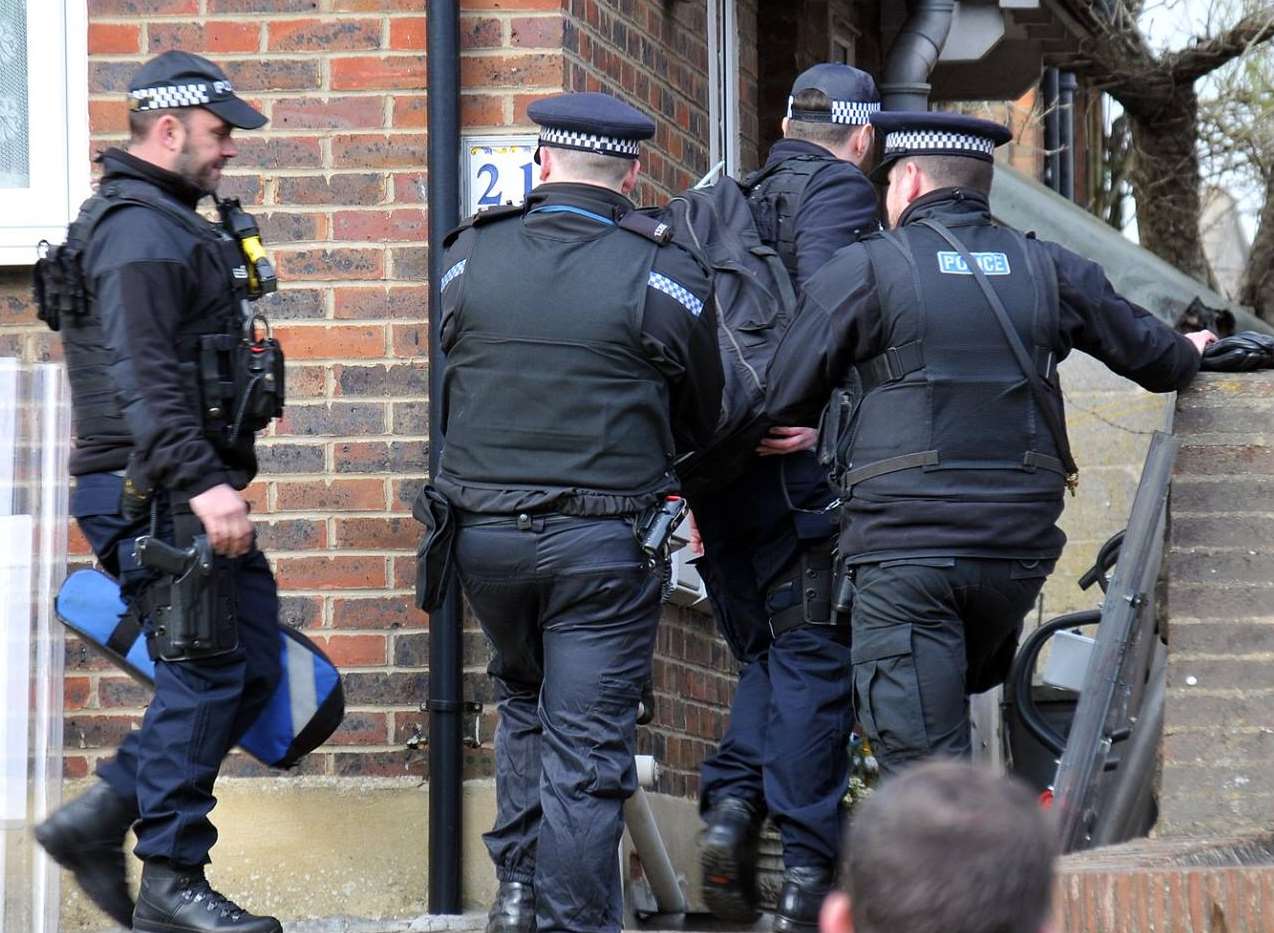 Police officers at the scene. Picture: Philip Hoath