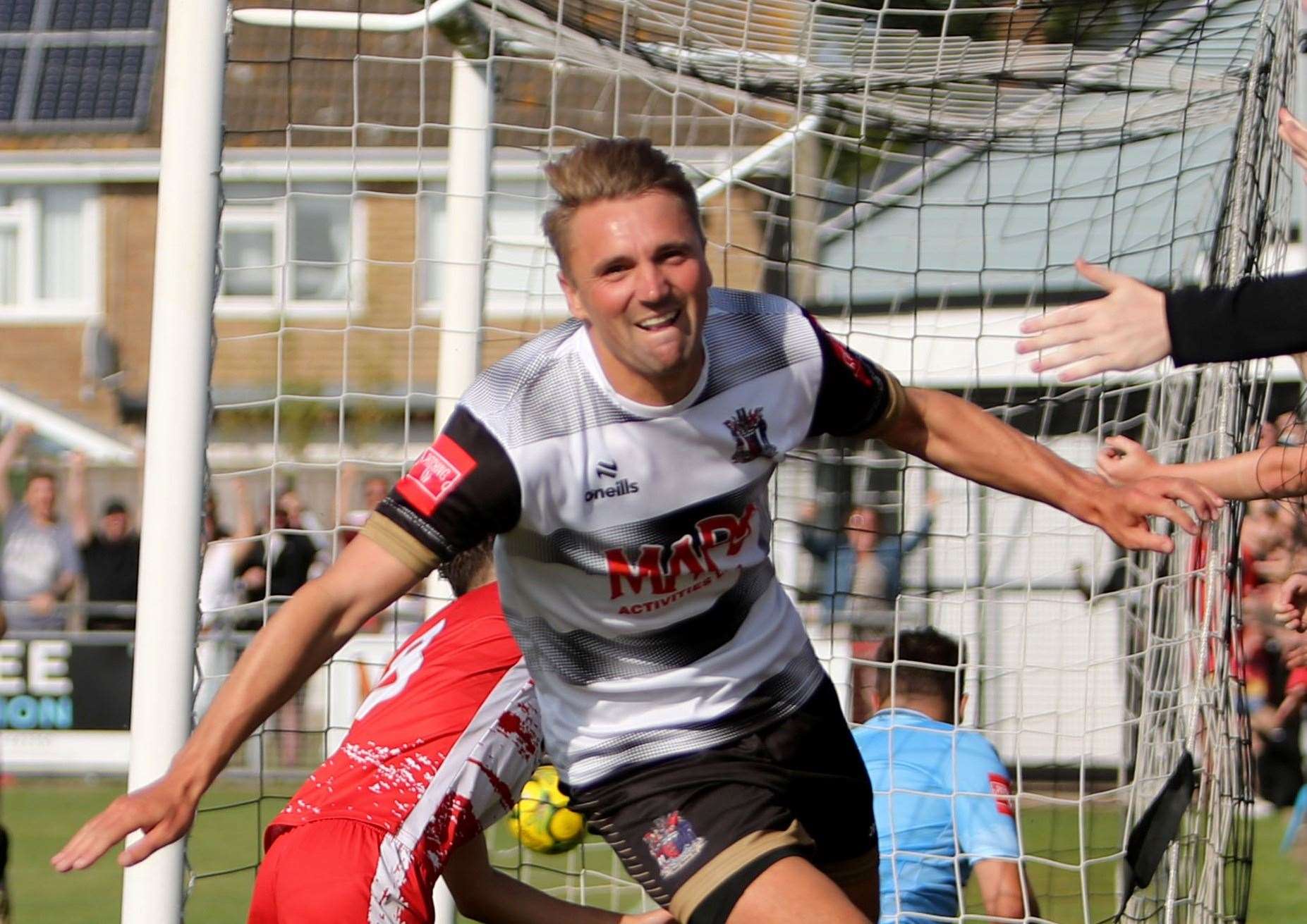 Deal's Tom Chapman celebrating his goal in the second half of their 4-2 Isthmian South East derby defeat to Ramsgate. Picture: Paul Willmott