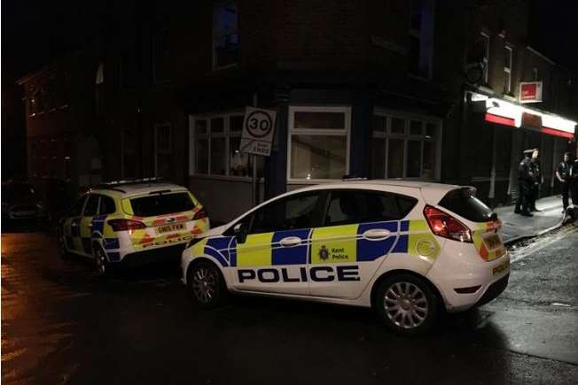 Police parked at the scene, on the corner of Upper Fant Road