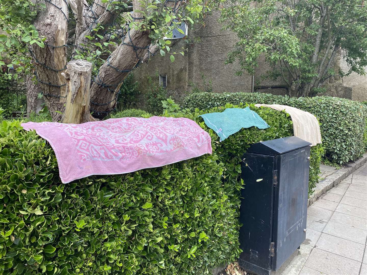 Staff at antiques shop, 18 the high street, left towels outside to dry after their back room was flooded