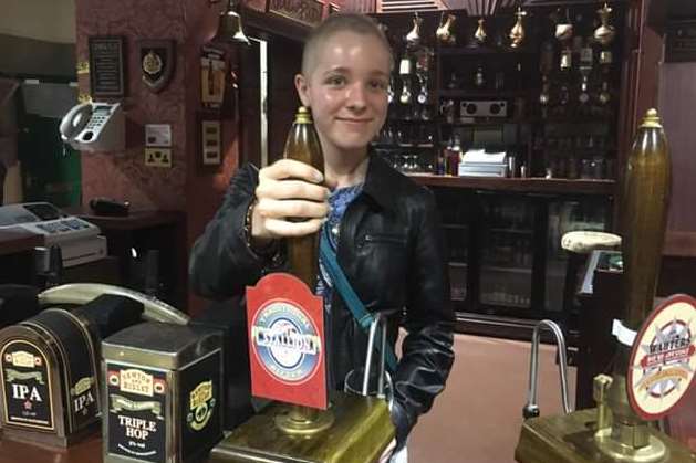 Kelly Turner pulling pints at the Rovers Return set at the Coronation Street studios.