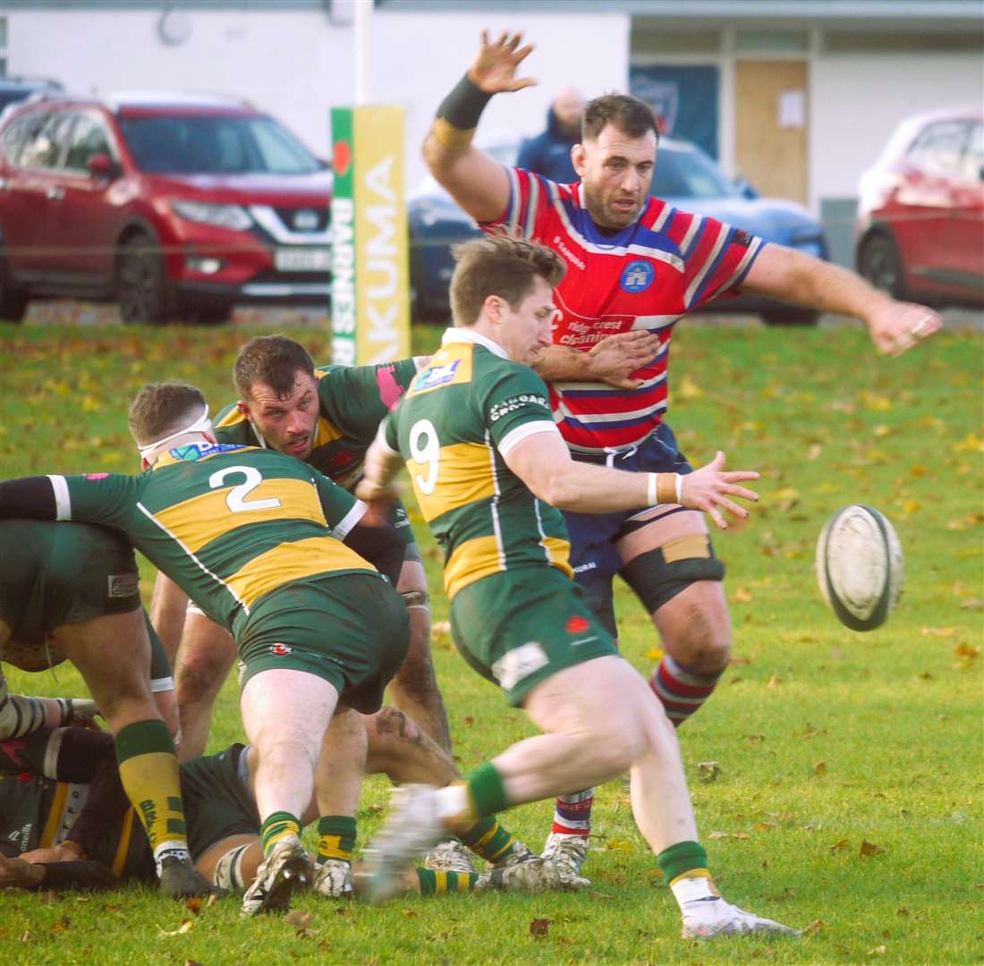 Tonbridge's Perry John Parker tries to charge down a Barnes kick. Picture: Adam Hookway