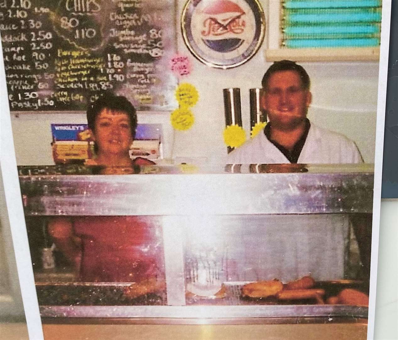 The pair pictured in their early days at the chip shop