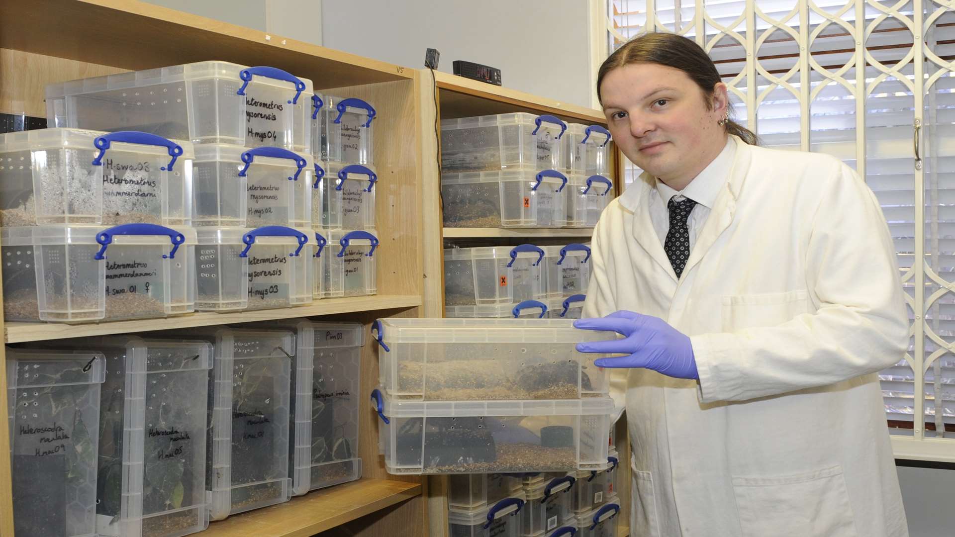 Stephen Trim with boxes of spiders