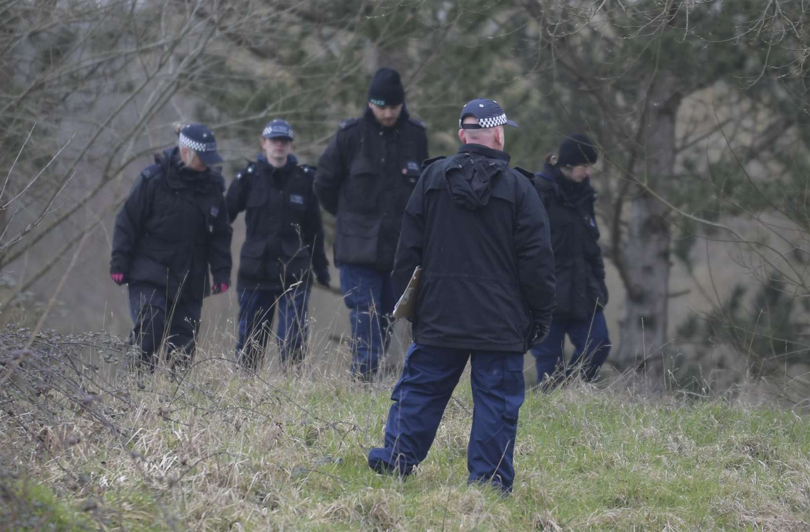 Officers searching the grounds on Wednesday morning. Picture: Barry Goodwin