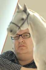 Artist Mark Wallinger with a model of his sculpture