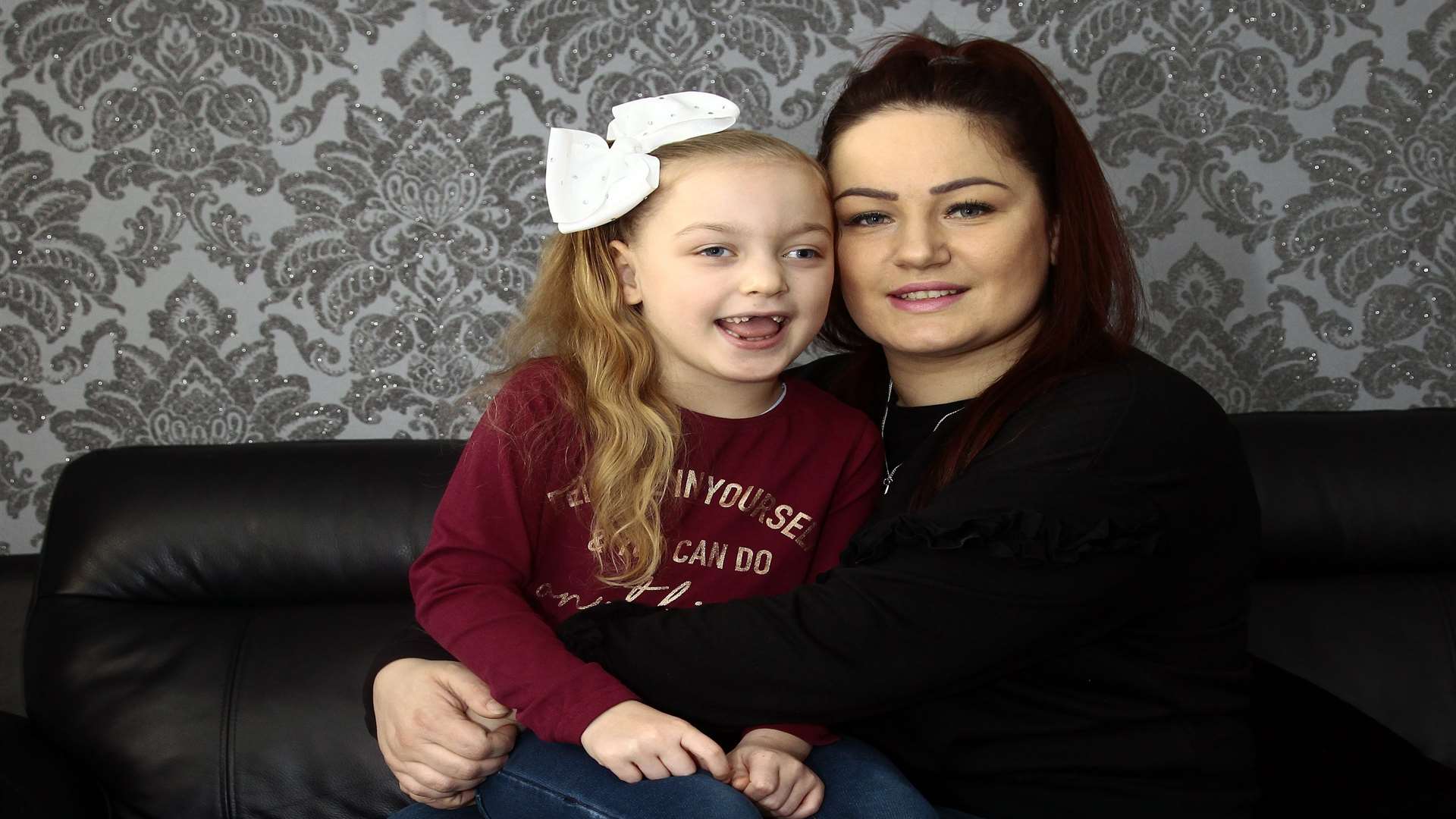 Lily-Mae Leadsham 5, just returned from hospital after spinal surgery to help her walk, also pictured with her mum Kerry at their home in Ringlestone, Maidstone.