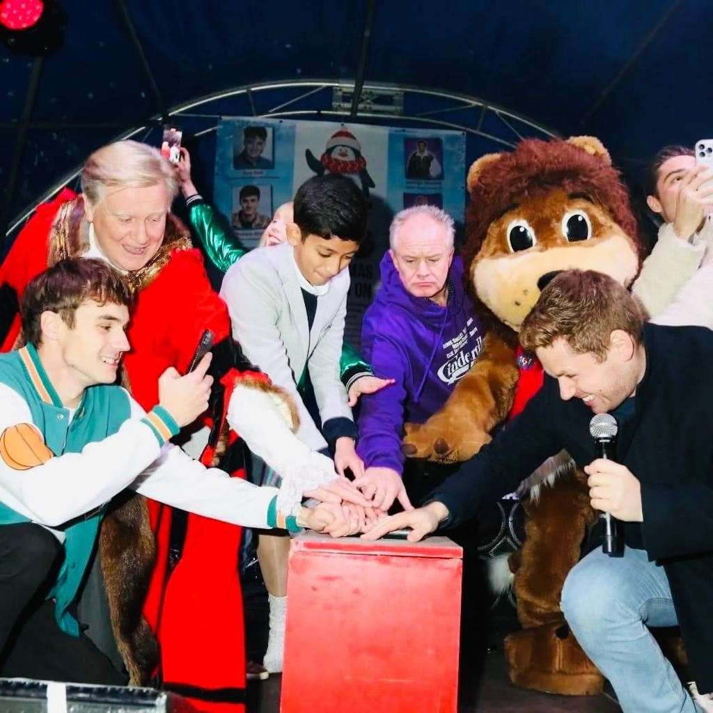 From left: Heartstopper actor Robbie White, Mayor of Dartford Cllr Paul Cutler, colouring competition winner Kayne Joseph, comedian Bobby Davro, Union J singer George Shelley, and Channel 5 Milkshake! presenter David Ribi.