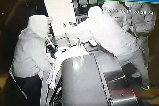 CCTV shows four people broke in