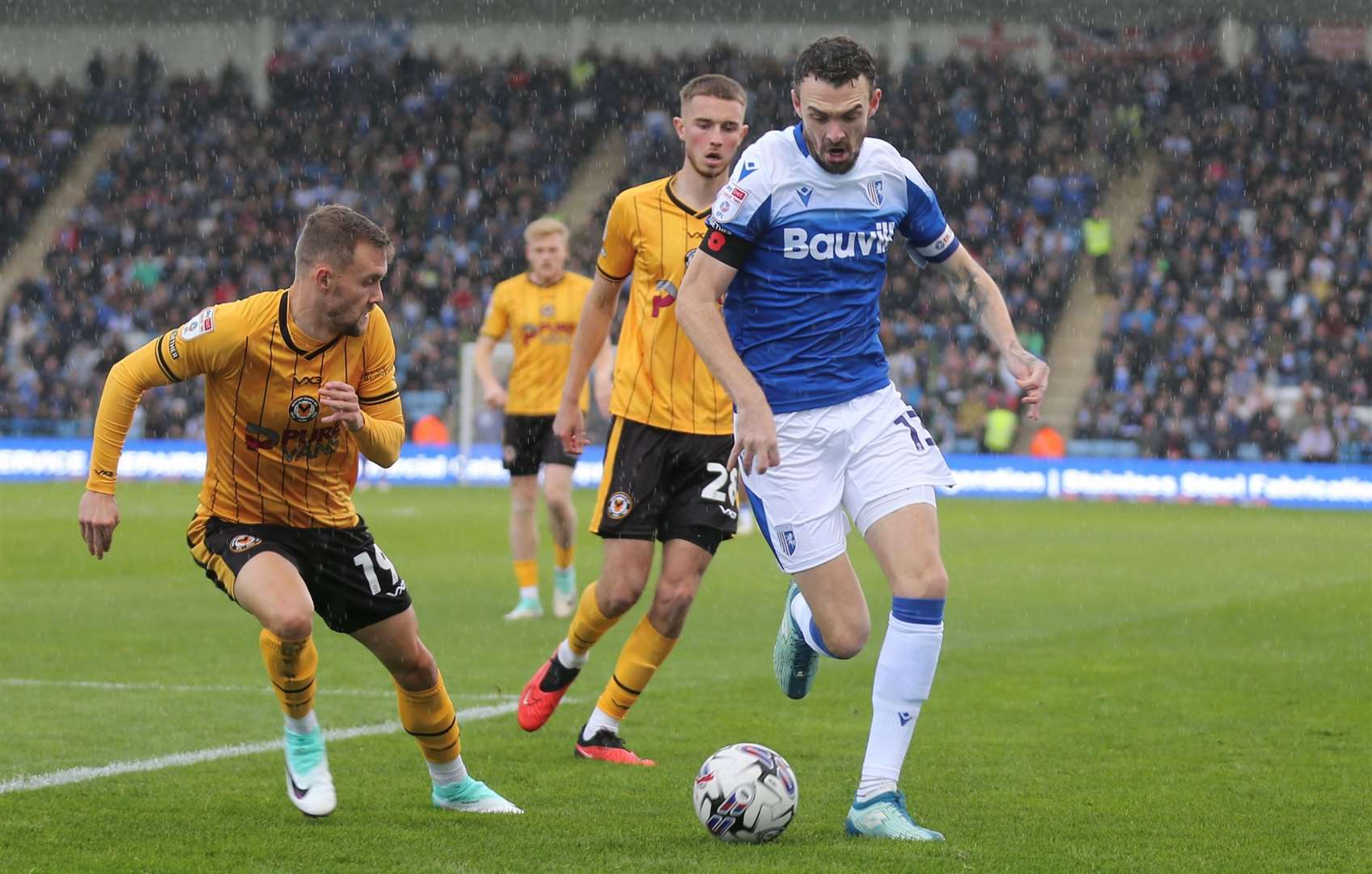 Scott Malone takes on his man as the Gills play Newport Picture: Beau Goodwin