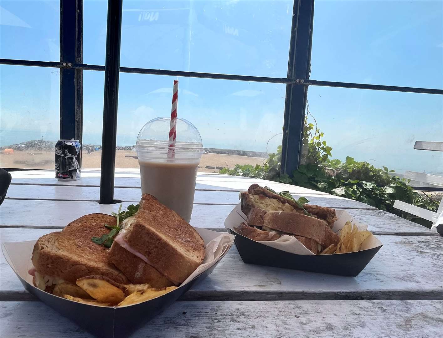 We got the cheese and caramelised onion toastie, ham and cheese toastie and a vanilla iced latte