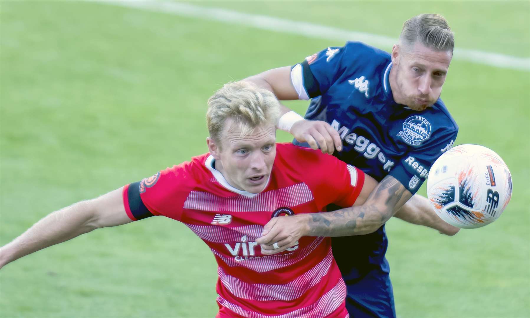 Ebbsfleet United's Josh Wright and Dover Athletic's Lee Martin during the FA Cup tie. Picture: Ed Miller / EUFC