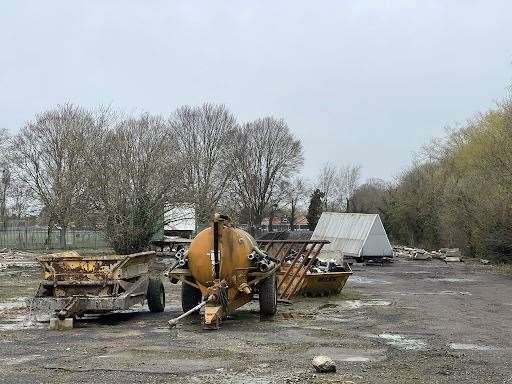 Police searching an abandoned builders' yard in Sandwich Picture: UKNIP