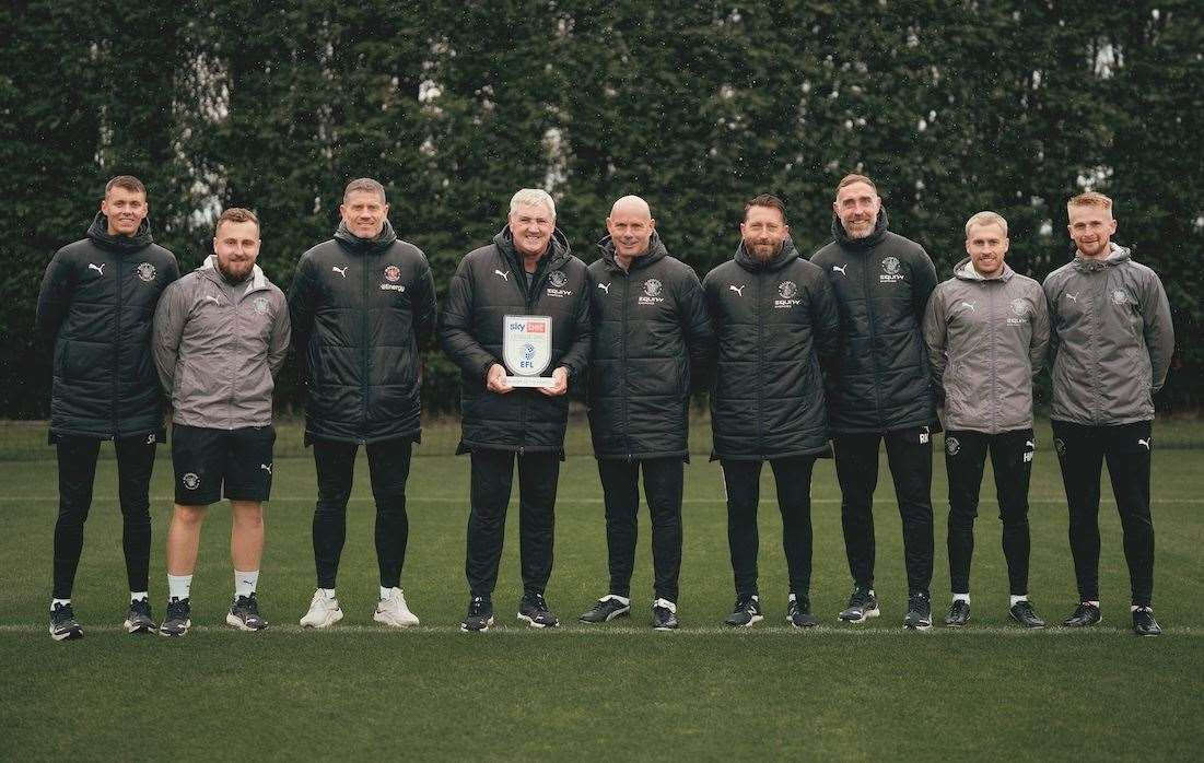 Steve Bruce and his Blackpool management team after picking up the September Sky Bet League 1 manager-of-the-month award Picture: EFL