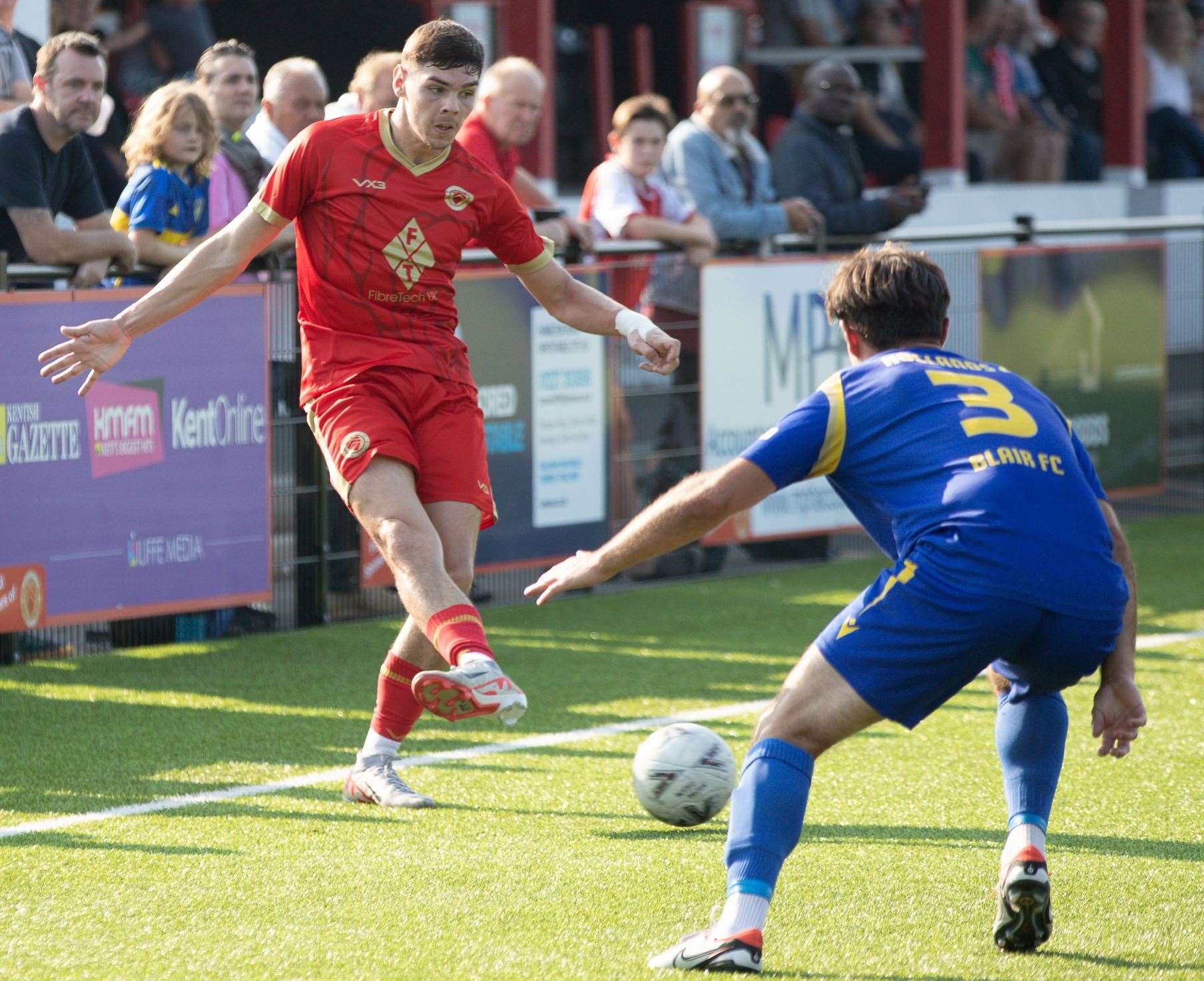 Whitstable’s Harvey Smith is up against George Sheminant of Hollands & Blair during their FA Vase second qualifying round tie on Saturday. Picture: Les Biggs