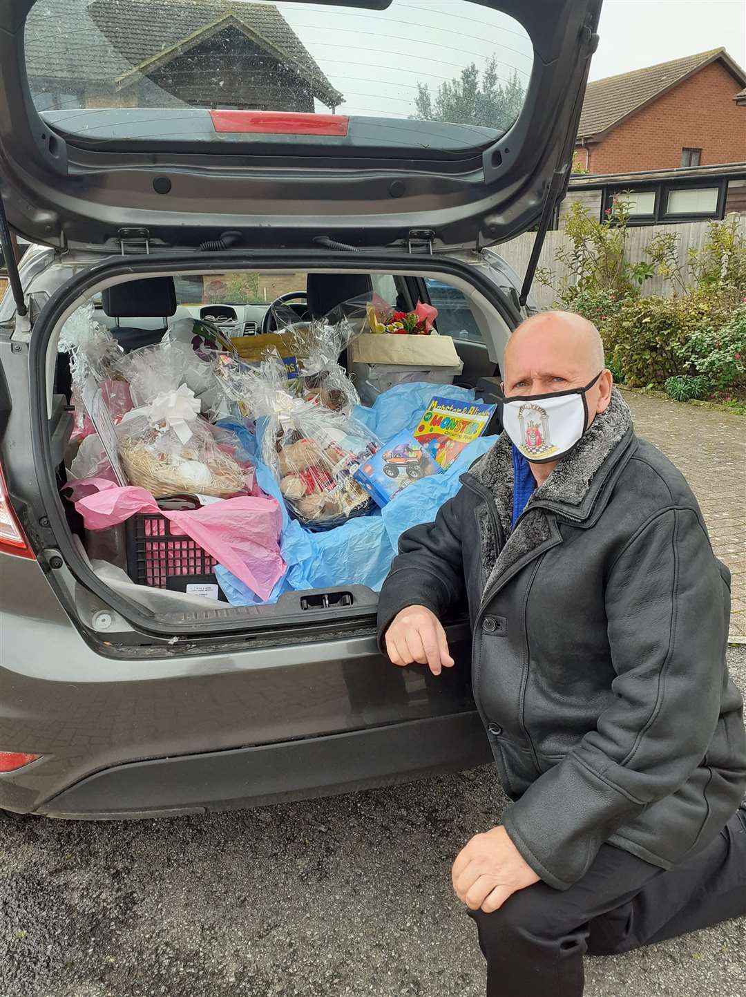 The family were surprised with a boot-full of goodies thanks to grant funding awarded to Talk It Out from the National Lottery