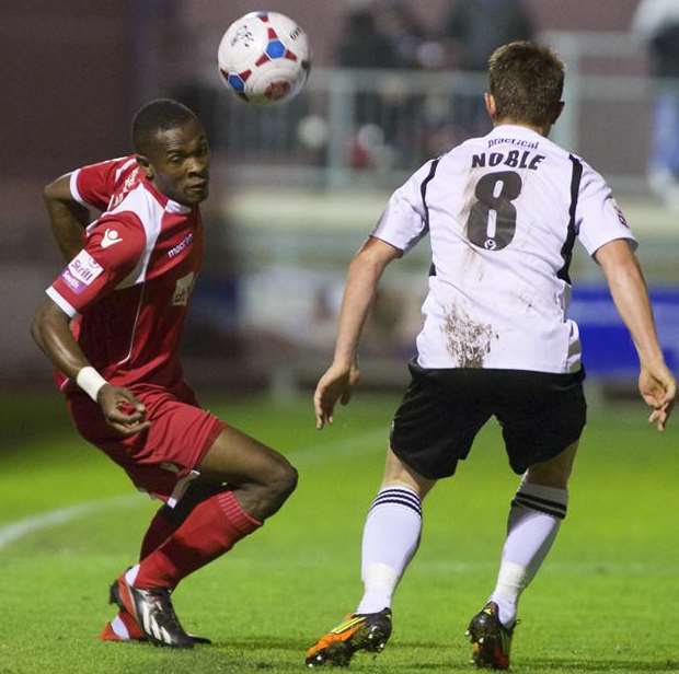 Anthony Cook turns away from Dartford's Lee Noble Picture: Andy Payton