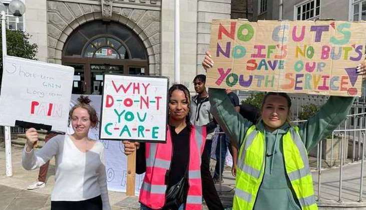 Young people protesting outside County Hall in Maidstone over youth service funding cuts