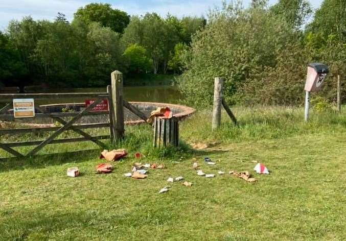 Just a day after KFC reopened drive thrus, the field behind the Brakes factory in Ashford was covered in packaging