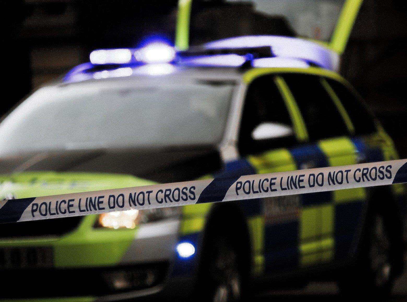 Police and passers-by had to lift the car off the injured passenger. Stock image