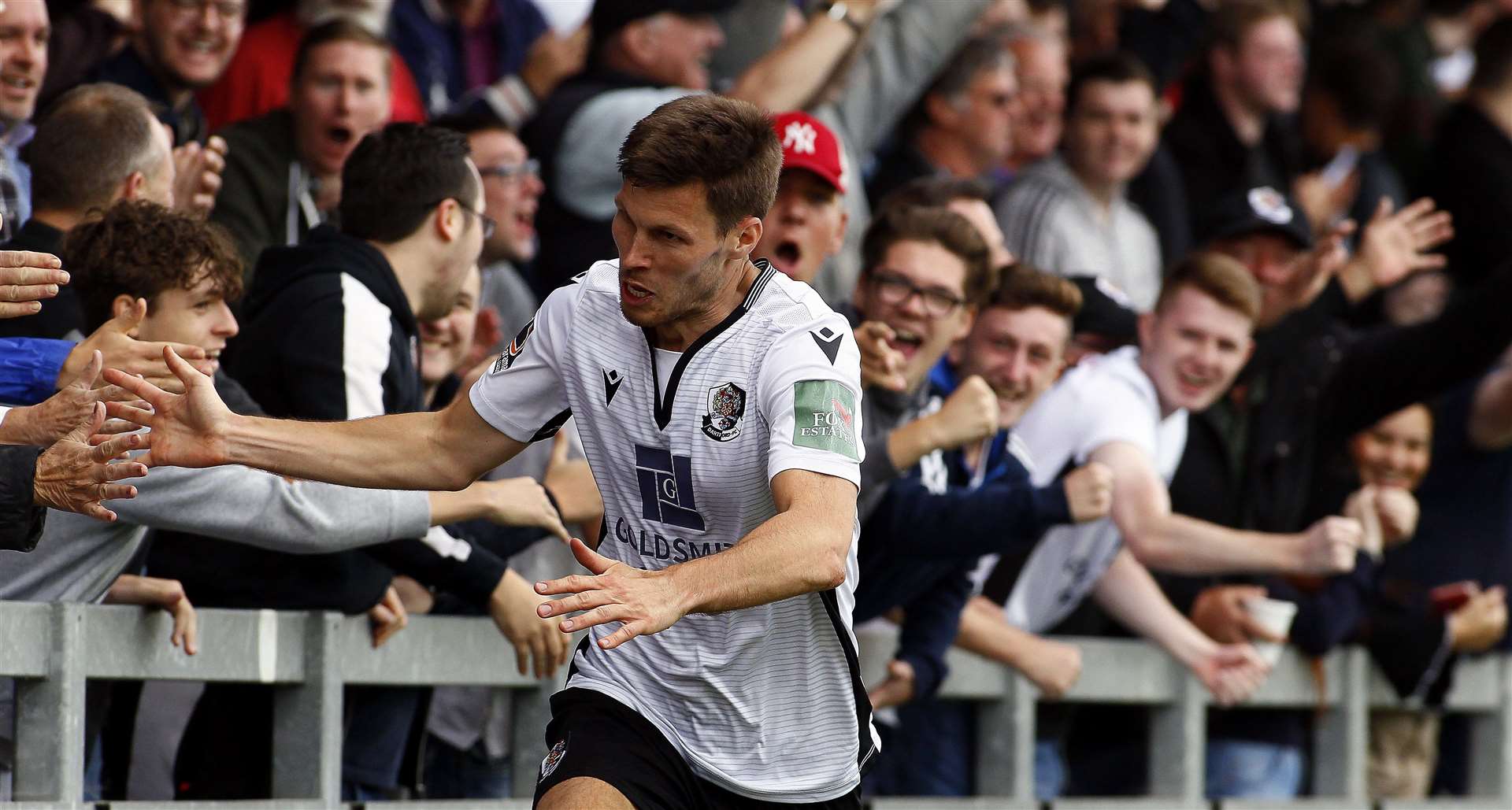 Charlie Sheringham celebrates after scoring Dartford's third goal against Dorking Wanderers. Picture: Sean Aidan