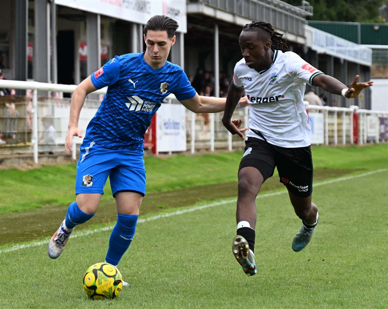 Dartford (blue) try to make progress at Dover on Saturday. Picture: Barry Goodwin