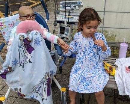 Aurora Pile-Gray with one of her sisters. Picture: Keisha Pile-Gray/Growing Pains Paper Planes