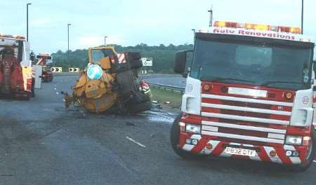 ROAD CLOSURE: The scene shortly after the tanker overturned. Picture: MIKE MAHONEY