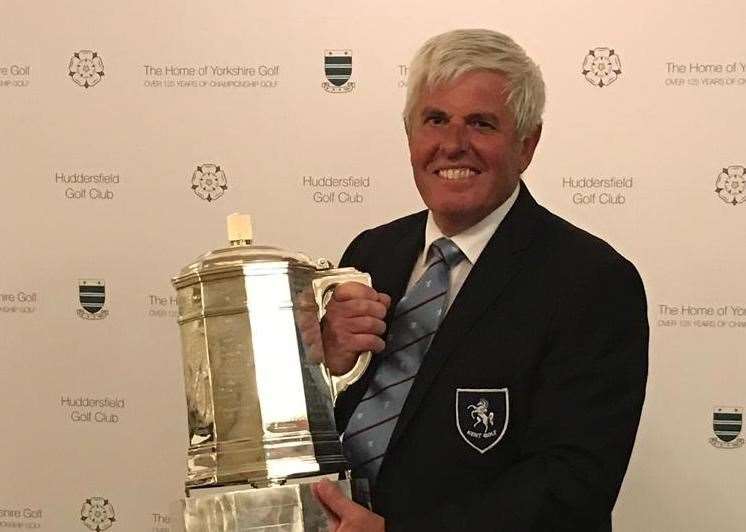 Paul Cannons with the trophy after Kent’s triumph in the England county finals last year