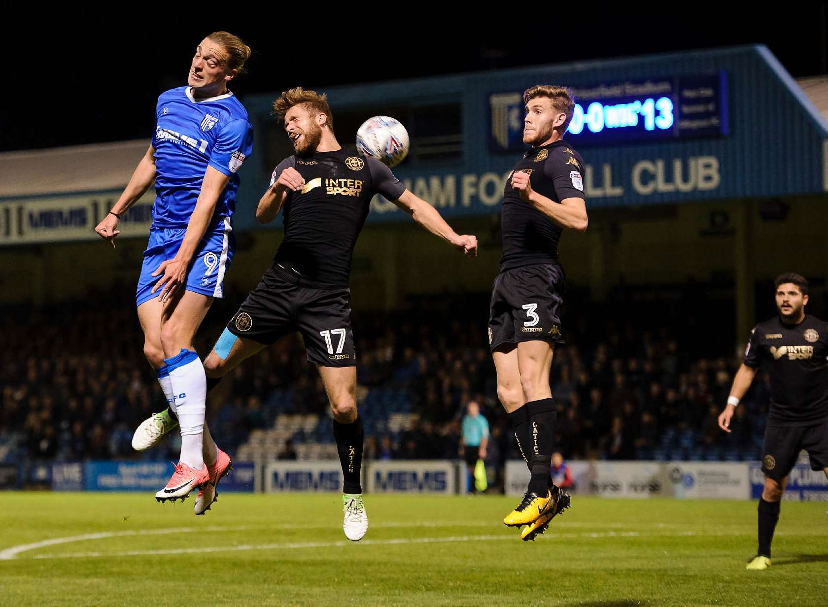 Tom Eaves rises to meet a cross Picture: Andy Payton