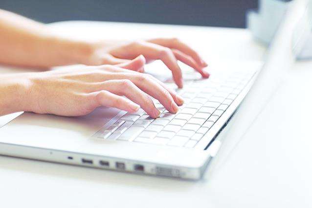 Businesswoman typing on laptop (2970778)