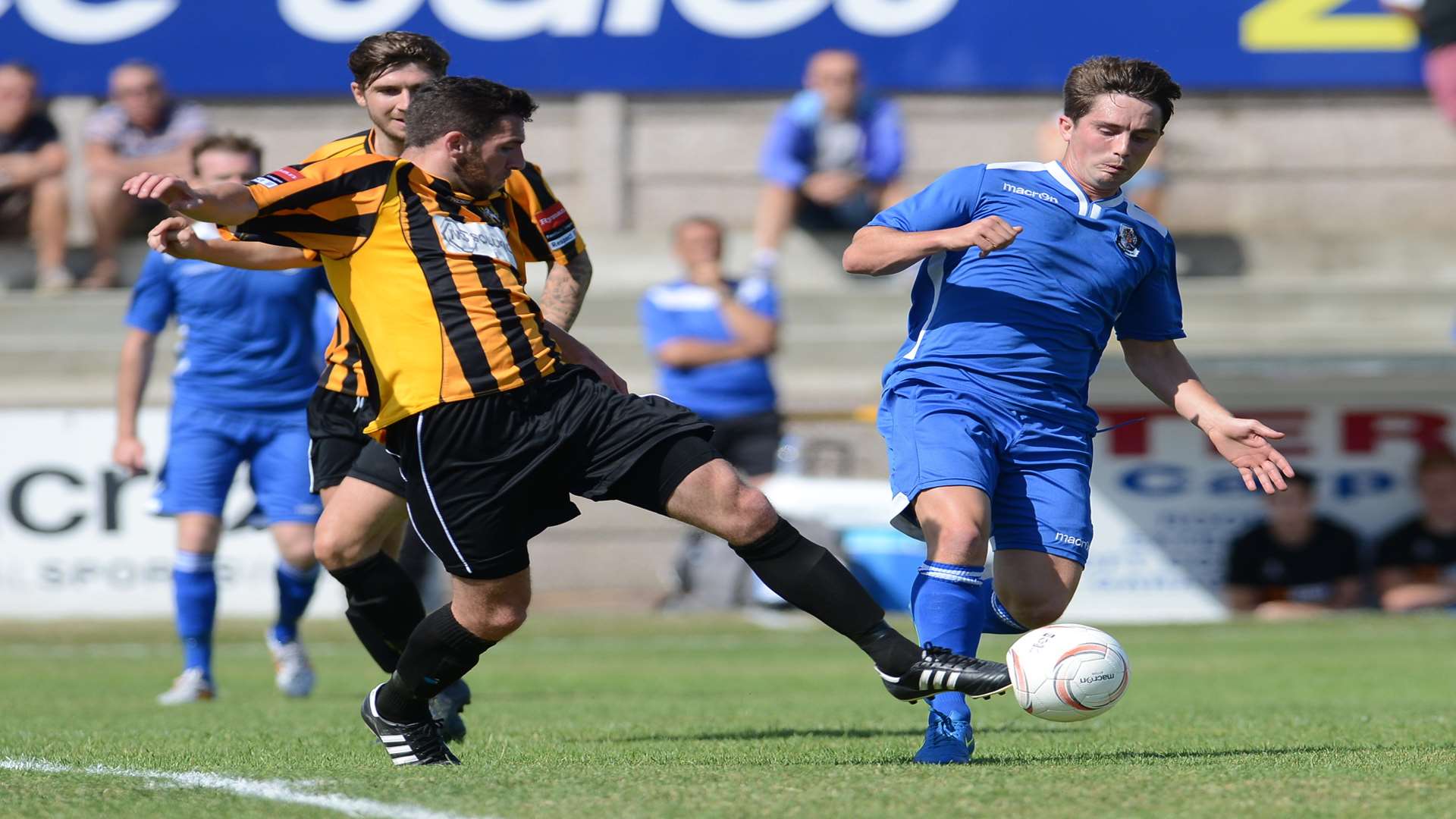 Ian Draycott challenges Lee Noble in midfield Picture: Gary Browne