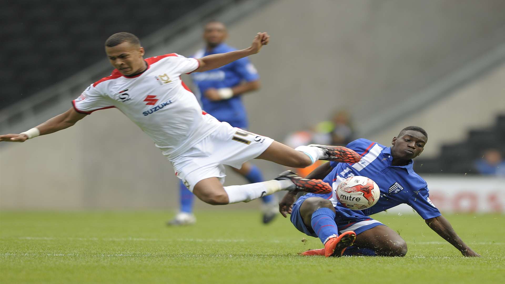 Jermaine McGlashan in action during last season's opener at MK Dons Picture: Barry Goodwin