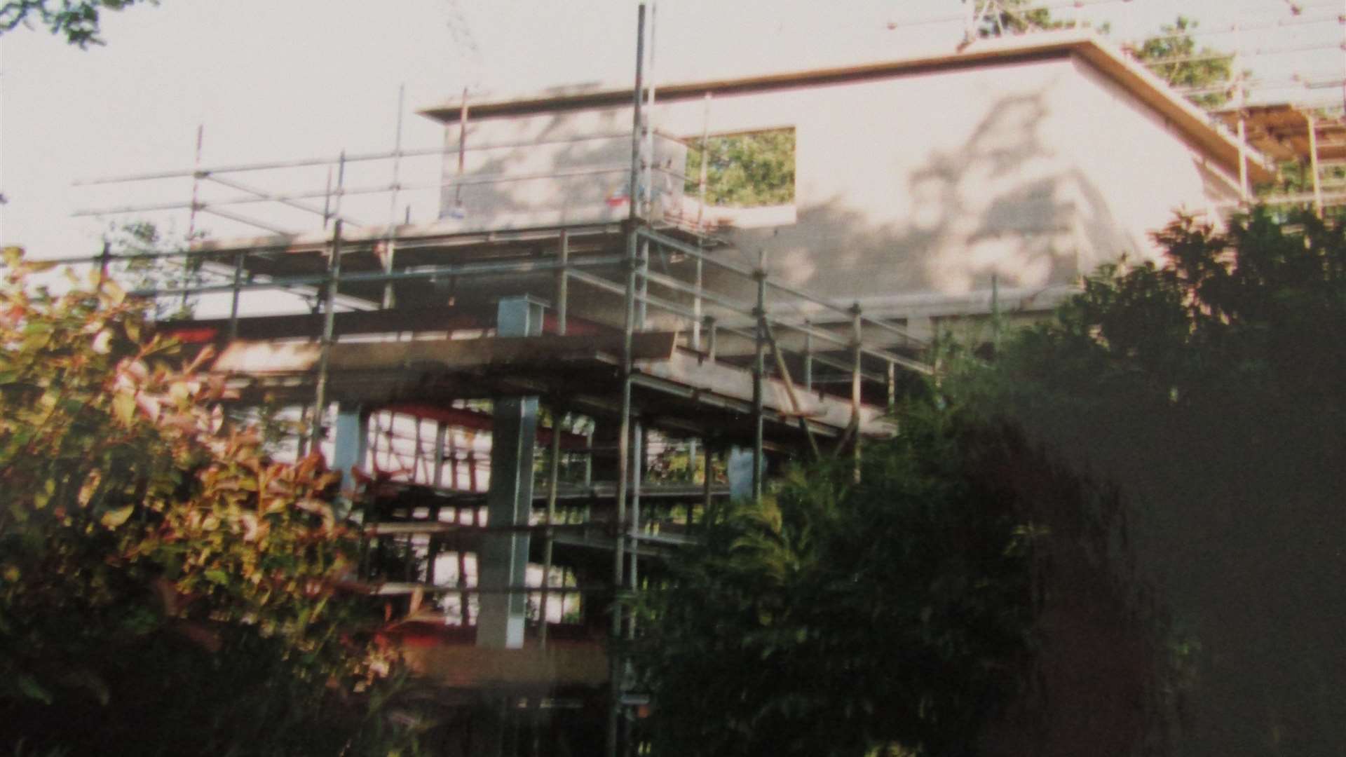 Scaffolding surrounds the water tower during building works