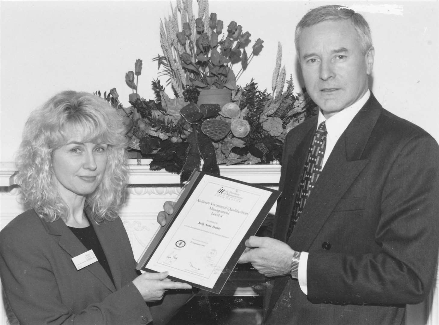 Kelly Reekie in 1995 as a senior librarian for the Folkestone area. She is pictured receiving a vocational certificate from the then Kent County Council leader Paul Sabin